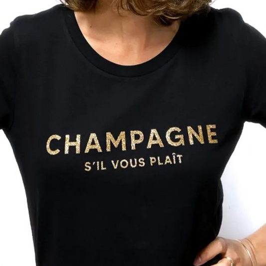 Svart t-shirt med guldglittrig text "Champagne s'il vous plait"